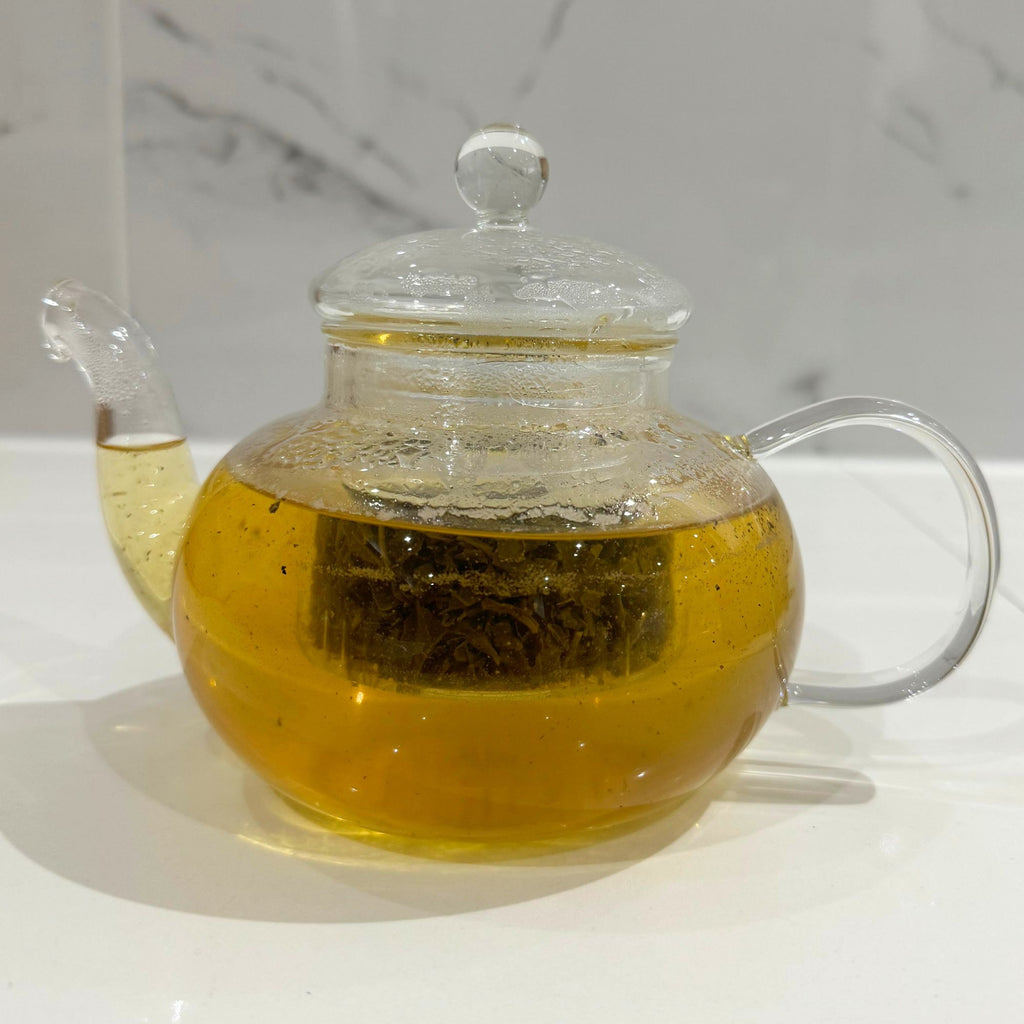 Glass Teapot brewing Green Tea Cup with Enchanted Morning Green Tea Blend